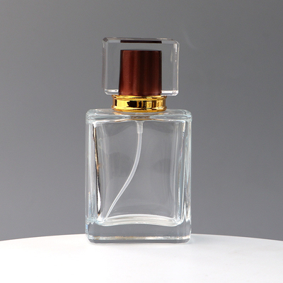 خرید بطری عطر شیشه ای شفاف اسپات مربعی بطری اسپری پوشش اکریلیک پرس مسافرتی بطری جداگانه بطری لوازم آرایشی و بهداشتی نمونه online manufacture