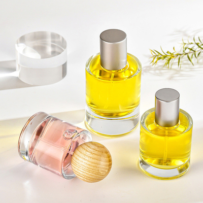 خرید بطری شیشه ای عطر 30 میلی لیتری 50 میلی لیتری سیلندر سرنیزه ای شفاف زیر بسته بندی عطر لوازم آرایشی و بهداشتی بطری اسپری با روکش چوبی online manufacture