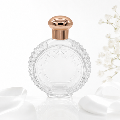 کف بطری عطر زاماک با بالای طلایی رز، مهر و موم ضد هوایی و طراحی حکاکی CNC